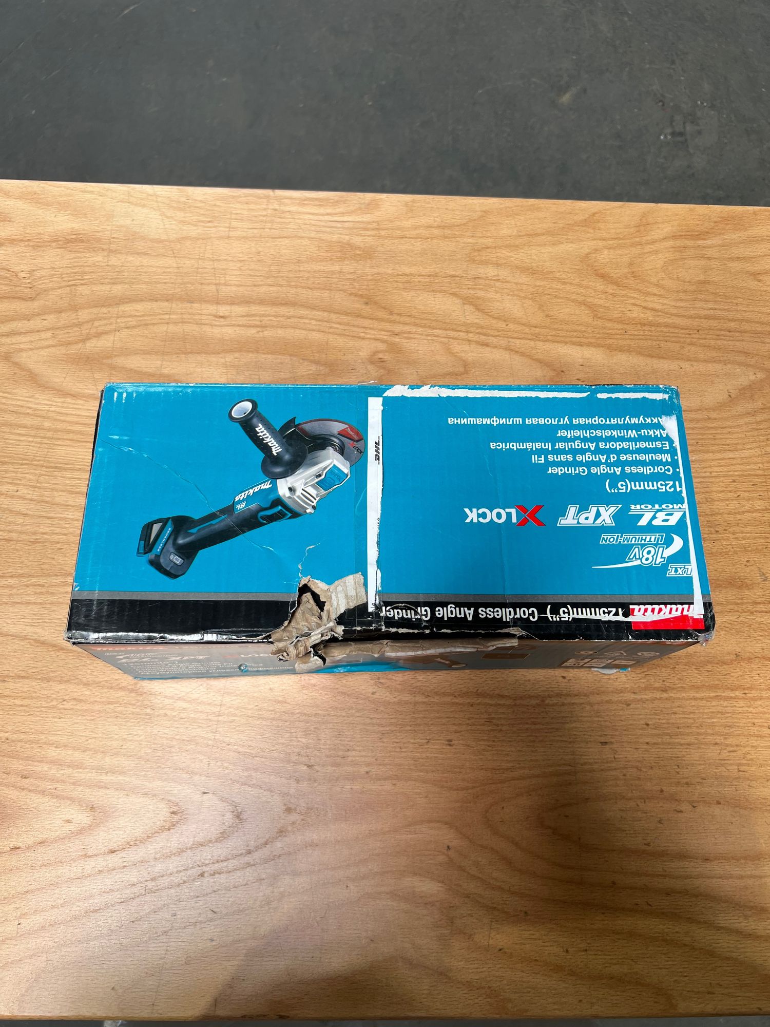 Makita DGA 521 ZX1 Akku Winkelschleifer 18 V 125 mm X LOCK Brushless Solo ohne Akku ohne Ladegeraet Reparaturgeraet 2 - toolbrothers